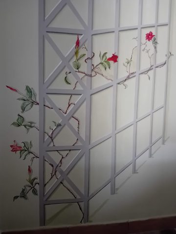 Particolare della decorazione - tralcio del fiore che si attorciglia nella grata